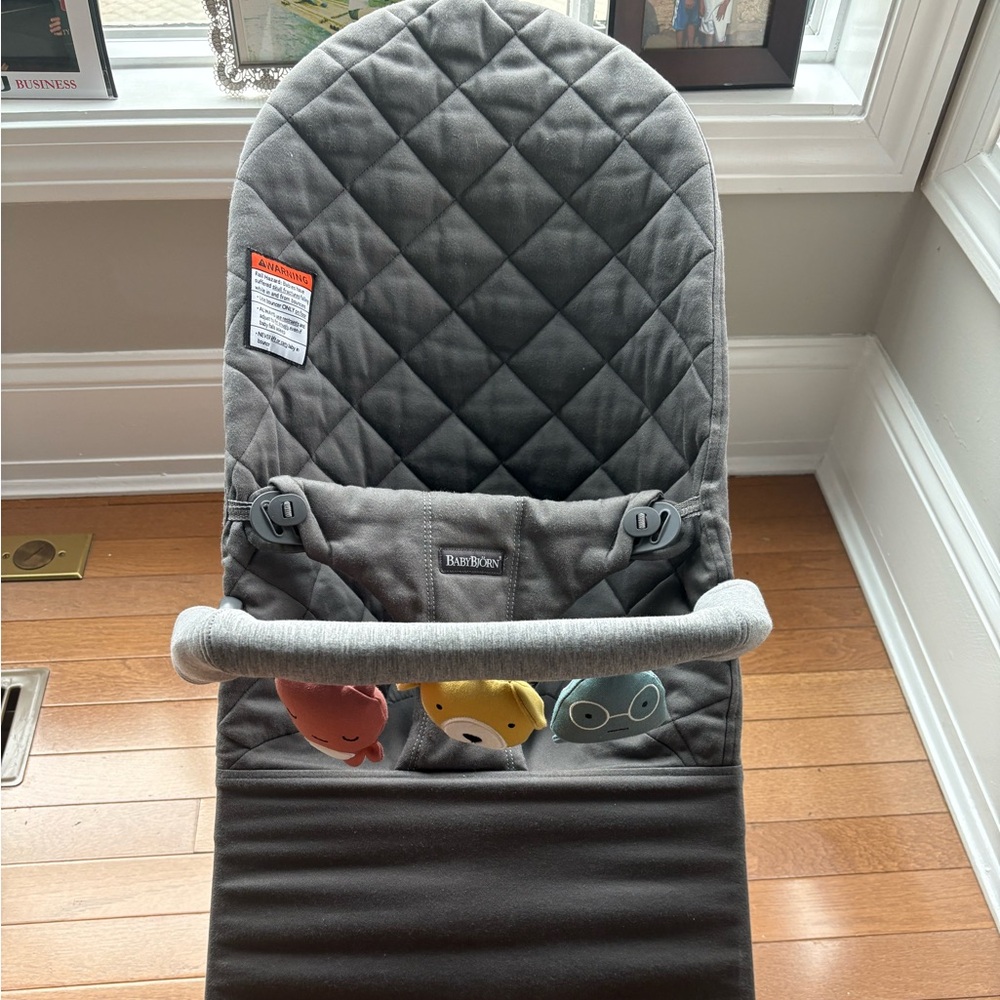 BabyBjorn Quilted Gray Baby Bouncer and soft toy bar